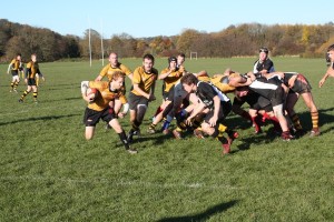 JCR men's rugby team: a runner emerges from a scrum